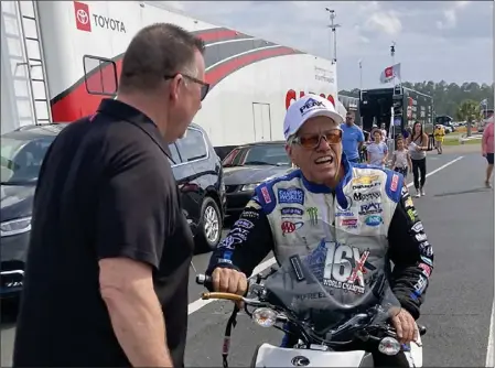  ?? MARK LONG — THE ASSOCIATED PRESS ?? Drag racer John Force, right, who was inducted into the Internatio­nal Drag Racing Hall of Fame on Thursday, is ready for his 47th NHRA season.