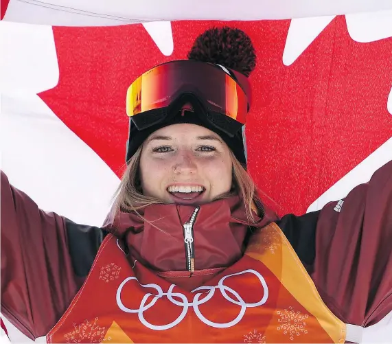  ?? — GETTY IMAGES FILES ?? Canada’s Cassie Sharpe celebrates on the podium after winning the gold medal in the women’s ski halfpipe final at the Phoenix Park in Pyeongchan­g. Sharpe is “leading the way in her sport,” says Stuart Robinson, her former coach.