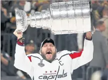  ?? JOHN LOCHER — THE ASSOCIATED PRESS ?? Alex Ovechkin screams in joy as he takes the Stanley Cup after the Capitals finished off the Golden Knights in five games.