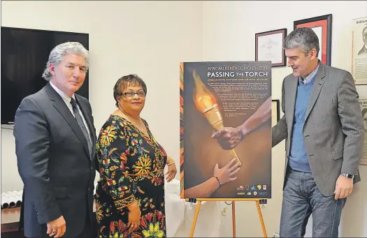  ?? LAWRENCE POWELL ?? Annapolis Royal Mayor William Macdonald, local resident Linda Bailey, and Nova Scotia Premier Stephen Mcneil unveiled a poster Friday, Feb. 10 marking African Heritage Month with the theme Passing the Torch: African Nova Scotians and the Next 150...