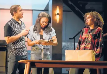  ?? CAROL ROSEGG ?? Wilson Jermaine Heredia, left, Dar. Lee. See. Ah., center, and Ashley LaLonde in“Next to Normal”at Westport Country Playhouse.