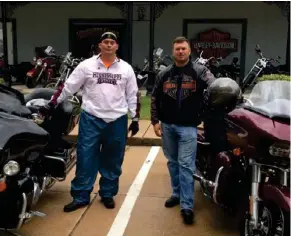  ?? (Courtesy Photo) ?? (Left to right) Drew Jones, 28, from Olive Branch, and Matt Stewart, 38, from Louisville completed a 1,500-mile motorcycle challenged named the Bun Burner. Here, the pair stand in Biloxi.