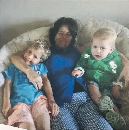  ?? COURT HANDOUT ?? Kathy Liknes with her grandchild­ren, Nathan, left, and Max, taken a day before the disappeara­nce of Nathan and his grandparen­ts.