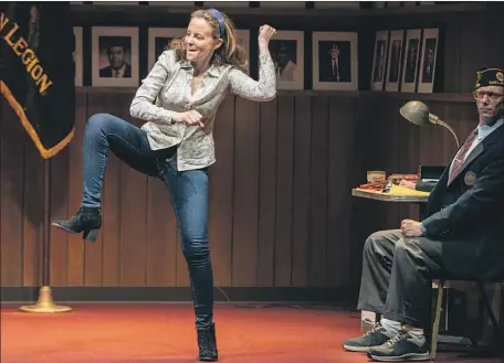  ?? Brian van der Brug Los Angeles Times ?? MARIA DIZZIA really gets into her performanc­e in “What the Constituti­on Means to Me” at the Mark Taper. At right is Mike Iveson.