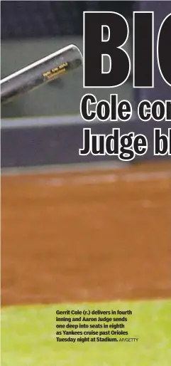  ?? AP/GETTY ?? Gerrit Cole (r.) delivers in fourth inning and Aaron Judge sends one deep into seats in eighth as Yankees cruise past Orioles Tuesday night at Stadium.