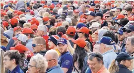  ?? MARK HUMPHREY/ASSOCIATED PRESS ?? People wait to enter a rally to see President Donald Trump in Chattanoog­a, Tenn., on Sunday. The president held get-out-the-vote rallies in Georgia and Tennessee.