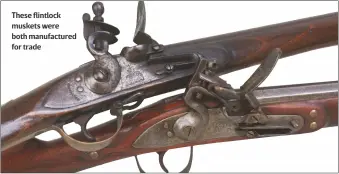  ??  ?? These flintlock muskets were both manufactur­ed for trade