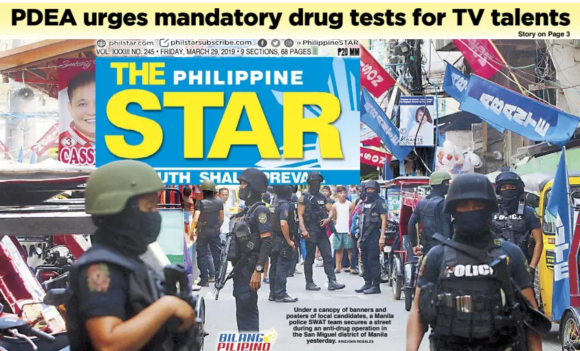  ?? KRIZJOHN ROSALES ?? Under a canopy of banners and posters of local candidates, a Manila police SWAT team secures a street during an anti-drug operation in the San Miguel district of Manila yesterday.