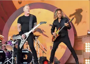  ??  ?? Reigning ragers: Hammett (right) and bandmate James Hetfield performing at the 2016 Global Citizen Festival in New York. — AFP
