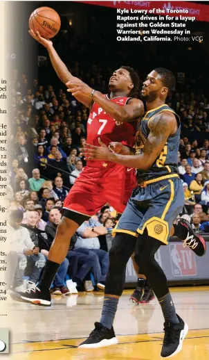  ?? Photo: VCG ?? Kyle Lowry of the Toronto Raptors drives in for a layup against the Golden State Warriors on Wednesday in Oakland, California.