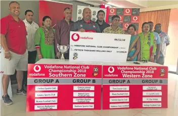  ?? Photo: Grace Narayan ?? Vodafone Fiji Sponsorshi­p manager Adriu Vakarau(fifth from left) hands over the cheque to Fiji Football vice president Yogeshwar Singh(fifth from right) on November 6,2018.