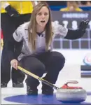  ?? The Canadian Press ?? Skip Rachel Homan, of Ottawa, watches a shot approach the house. On Tuesday, she won her opening game at the Masters.