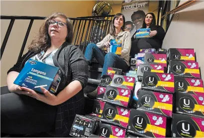  ?? BARRY GRAY THE HAMILTON SPECTATOR ?? United Way staff members Gillian Surette-Robinson, Lindsay Forsey and Kayla Willet are co-ordinating a donation of menstrual supplies that will be available for free to HWDSB students in 10 schools as part of a pilot project.