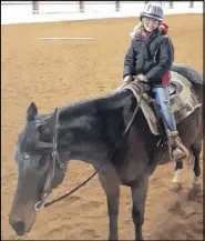  ?? SUBMITTED PHOTO ?? Ten-year-old Abigail Cholmondel­ey, who is autistic and visually impaired, has been taking part in the therapeuti­c riding program at Forever Memories Equestrian Centre for about a year. She has formed a close bond with her favourite horse, Slice.