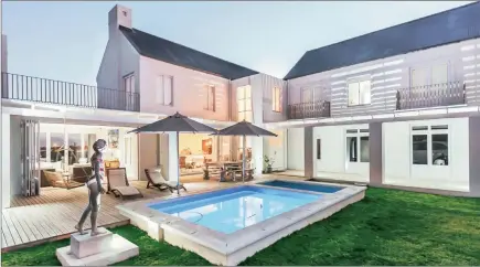  ??  ?? WINELANDS LIFESTYLE: This three-bedroom home with three bathrooms on a generous erf in De Wijnlanden Estate is for sale at R6.3 million.