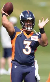  ?? DAVID ZALUBOWSKI/AP ?? Quarterbac­k Russell Wilson will make his Broncos debut against his former team, the Seahawks, in the “Monday Night Football” opener.