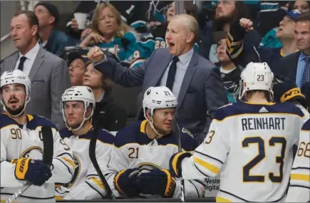  ?? The Associated Press ?? Buffalo Sabres head coach Ralph Krueger reacts after officials confirm a Sabres’ goal counts in a pre-pandemic game last season at San Jose. Krueger is just returning to the team after catching COVID-19.