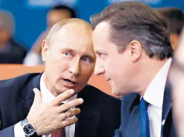  ?? ?? Vladimir Putin and then-uk Prime Minister David Cameron in 2012