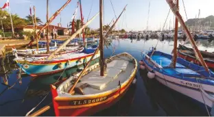  ??  ?? Lateen-rigged classic fishing boats contribute­d to Sanary being a delightful destinatio­n