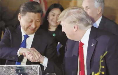  ?? AP PHOTOS ?? WORLD TENSIONS: President Trump, right, shakes hands with Chinese President Xi Jinping last night during a dinner at Mar-aLago in Palm Beach, Fla. At left, a North Korean soldier points his weapon in Sinuiju, North Korea, which fired a missile a day...