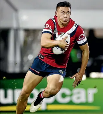  ??  ?? Tokoroa-born Joseph Manu runs the ball during the round 15 NRL match between the New Zealand Warriors and the Sydney Roosters.