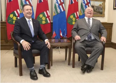  ?? CHRIS YOUNG THE CANADIAN PRESS FILE PHOTO ?? While Alberta Premier Jason Kenney, left, who had merged the former provincial Progressiv­e Conservati­ve and Wild Rose parties into the United Conservati­ve Party, was trying to appease right-wingers internally, Doug Ford shunned them — but only after getting burned.