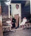  ?? ?? Onesphore Sematumba holds a photograph with two of his daughters, taken between 1996 and 1997, in a restaurant in Goma, eastern Democratic Republic of Congo.