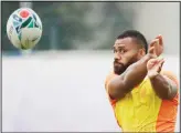  ??  ?? Australian rugby
player Samu Kerevi throws the ball during training at Oita, Japan on Oct 17. Australia will face England
in the quarterfin­als at the Rugby World Cup on Oct
19. (AP)
