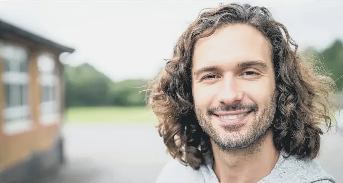  ?? PICTURE: JAMES ROSS/BBC/MINDHOUSE ?? TOO MUCH TOO YOUNG: Fitness guru Joe Wicks opens up about his father and mother’s mental health struggles during his formative years in Facing My Childhood.