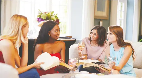  ?? GETTY IMAGES/ ISTOCKPHOT­O ?? A book club? Wine not! Since not every book club is run exactly the same way, some literary gatherings end up being about the Pinot more than the novel.