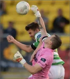  ??  ?? Goalkeeper Graham Doyle comes under strong pressure.