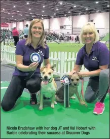  ??  ?? Nicola Bradshaw with her dog JT and Val Hobart with Barbie celebratin­g their success at Discover Dogs