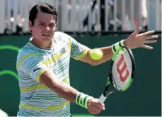  ?? AP PHOTO ?? Milos Raonic returns the ball to Mikael Ymer during the Miami Open tennis tournament on Friday in Key Biscayne, Fla.