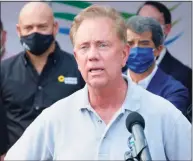  ?? Peter Yankowski / Hearst Connecticu­t Media ?? Gov. Ned Lamont speaks during a press conference outside the CTown grocery store on North Street in Danbury on Aug. 27.