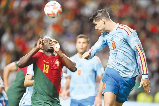  ?? ?? ±
Portugal’s Danilo Pereira (left) vies with Spain’s Alvaro Morata during their Nations League match.