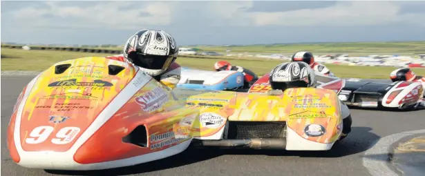  ??  ?? Stephen Ramsden and Matty Ramsden in action at Anglesey Circuit