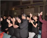  ?? JESI YOST - FOR MEDIANEWS GROUP ?? Pine Forge Academy students stand and cheer for the Boyertown Area High School Show Choir.