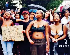  ?? PHOTO: FREDLIN ADRIAAN ?? Rhodes University female students protested topless during a rape culture awareness campaign.