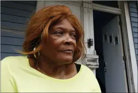  ?? MARTHA IRVINE — THE ASSOCIATED PRESS ?? Dianne Green sits on the porch of her home in Chicago on Wednesday. Green, a retiree and cancer survivor, said she struggled with loneliness after several family members died in 2019and early 2020. Then the pandemic hit. She credits a “friendly caller” from Rush University Medical Center with pulling her out of the depths of despair.