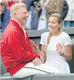  ??  ?? Novak Djokovic’s wife Jelena Ristic speaks with his coach Boris Becker.