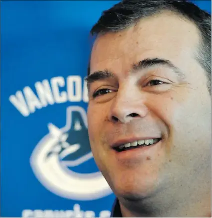  ?? JENELLE SCHNEIDER/ PNG ?? Vancouver Canucks coach Alain Vigneault holds a press conference on Friday, his first media mingle since the NHL lockout ended.