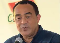  ??  ?? Minister of Health Dr Christophe­r Tufton speaks at the launch of Coldfield Manufactur­ing’s Big Jo Z, a zero sugar beverage, at Clan Carthy Primary School on Thursday.