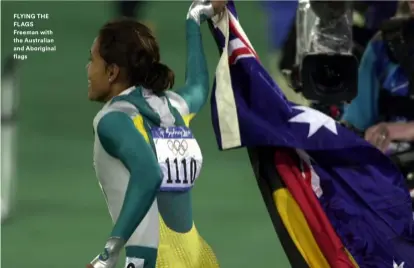  ??  ?? FLYING THE FLAGS Freeman with the Australian and Aboriginal flags