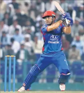  ?? GETTY ?? Samiullah Shenwari of Afghanista­n scored 36 off 18 balls with three sixes.