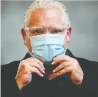  ?? SEAN KILPATRICK / THE CANADIAN PRESS FILES ?? A recent survey by Leger and the Associatio­n for Canadian Studies found that Ontarians' satisfacti­on with Premier Doug Ford declined from 75 per cent at the
beginning of the pandemic to 53 per cent.