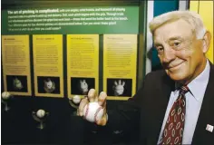  ?? TONY DEJAK — THE ASSOCIATED PRESS ?? Baseball Hall of Famer Phil Niekro shows in 2007 the grip he used on his famed knucklebal­l, which helped him to 318 wins. Niekro died Sunday at 81.