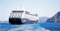 ??  ?? The Azamara Journey edges close to Santorini.The 690-passenger ship offers vacationer­s more time on land and the opportunit­y to visit ports that aren’t accessible to larger ships.