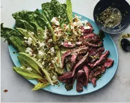  ??  ?? Lidey Hueck’s skirt steak with salsa verde salad.