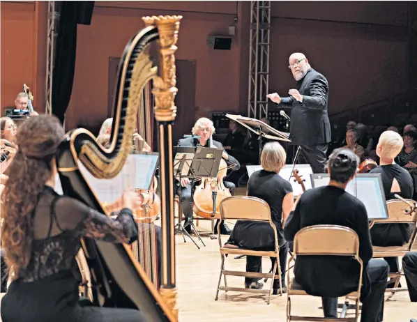  ?? ?? The English Symphony Orchestra conducted by Kenneth Woods at the Elgar Festival, above, for which Julian Lloyd Webber, right, wants to raise additional funding