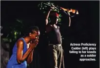  ??  ?? Actress Proficienc­y Cadder (left) plays falling to her kneels as a soldier approaches.